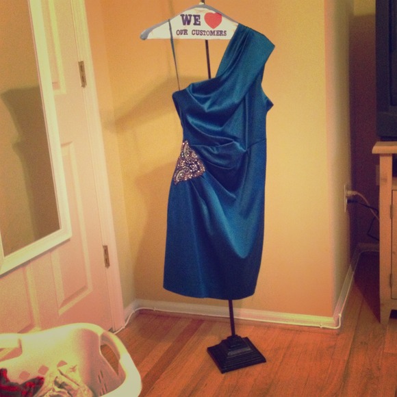 Teal cocktail dress worn once and dry cleaned.