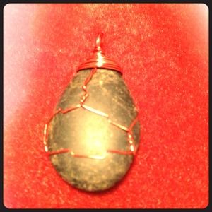 pendent black stone & wrapped in red copper wire