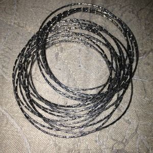 Attached silver bangles