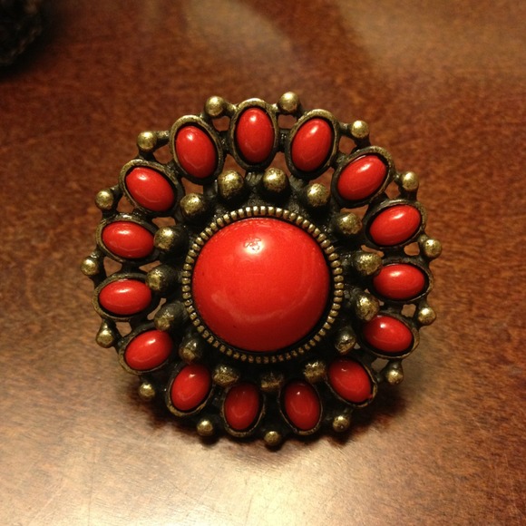 Red adjustable ring
