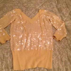 Yellow sequined sweater