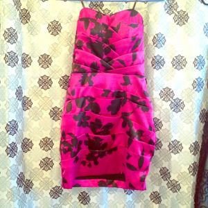 Magenta and black flower pattern dress.