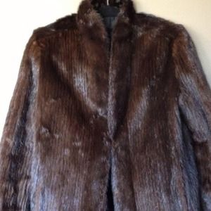 Brown mink.  Car coat length. Size medium