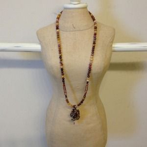 Beaded necklace with Sterling silver charms