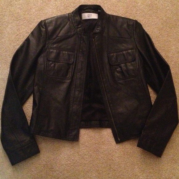 Just reduced!! Very sleek black leather jacket.