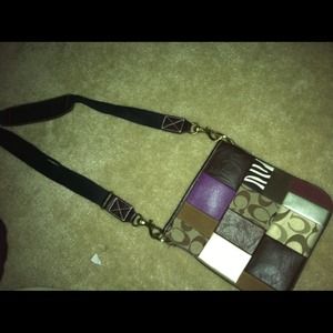 Looks like Coach cross body bag!