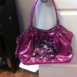 Feathers and rhinestones and silver tabs,