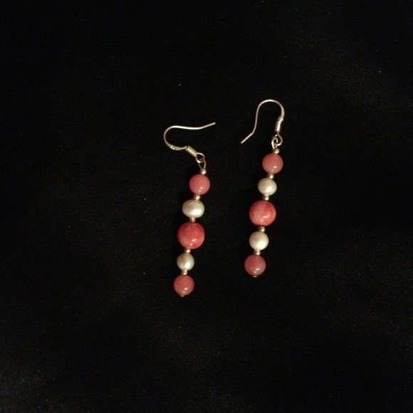 Genuine Mother of Pearl and Cats Eye earrings.