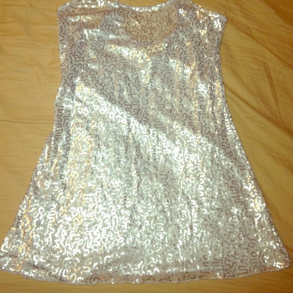 Sexy silver see through top; nice sequin work