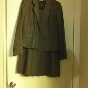 Double breasted suit with pleated long skirt