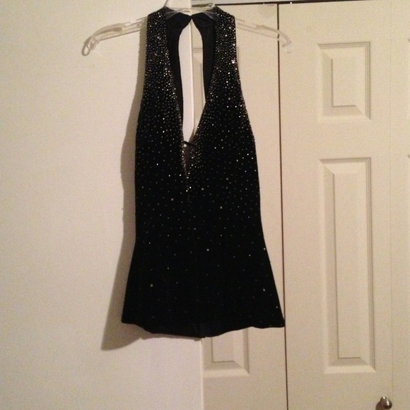 Black sequin top. Halter style. Beautiful