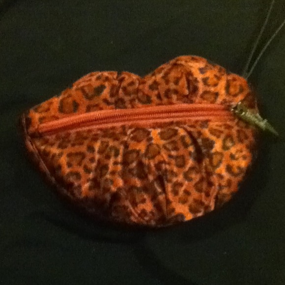 Betseyville pink leopard wristlet
