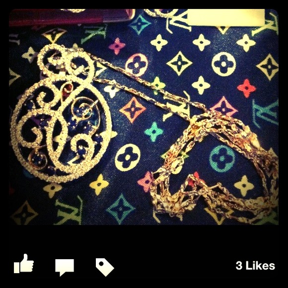 This is a long necklace with patent