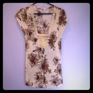We love Vera top from Anthropologie