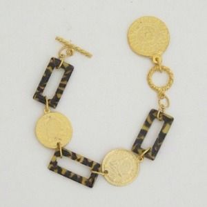 Tortoise and hand cast gold bracelet with toggle