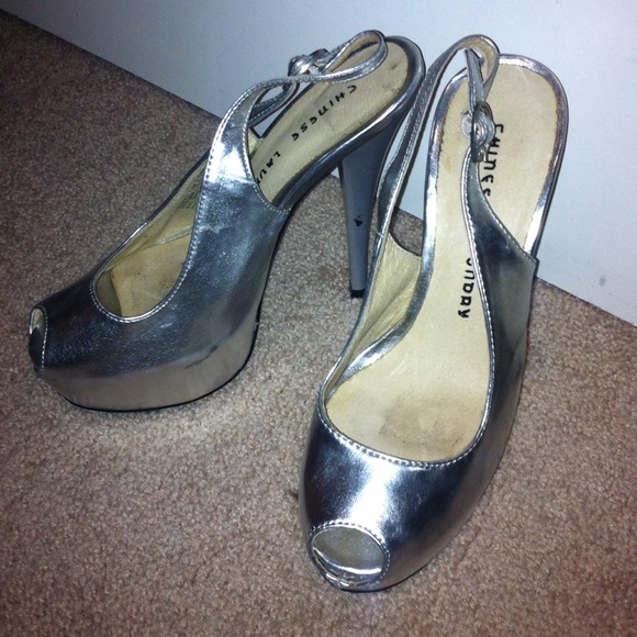Sling back peep toe platforms