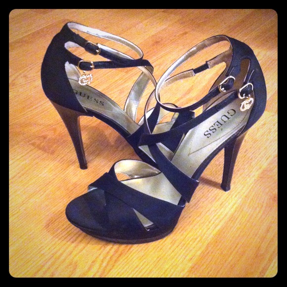 Gorgeous black GUESS platform strap pumps.
