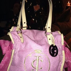 Juicy Couture Purse with shimmering pink bows. 😍