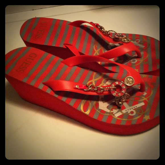 Guess wedge flip flops. Size 10