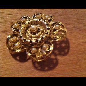 Golden flower and pearl brooch