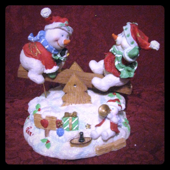 Snowmen on a see-saw!