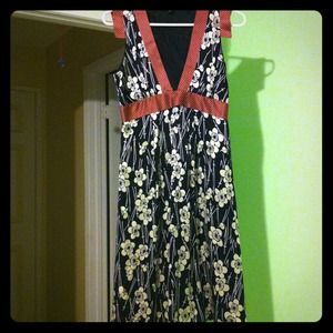 BEBE silk knee length dress.