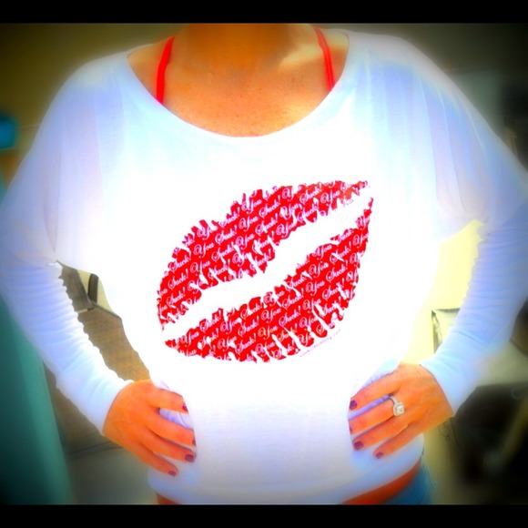 Slouchy top with YOU SUCK! Written as the lips