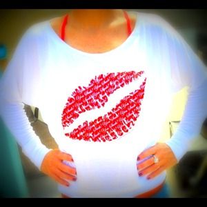 Slouchy top with YOU SUCK! Written as the lips