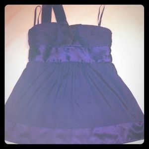 BEBE deep purple one shoulder dressy top.