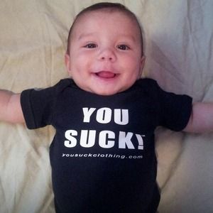 Black baby "You Suck!" onesies