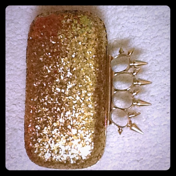 Gold glitter spike nuckle clutch
