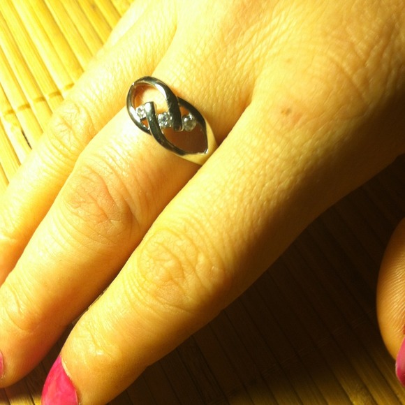 NEW ring with three cz diamonds.