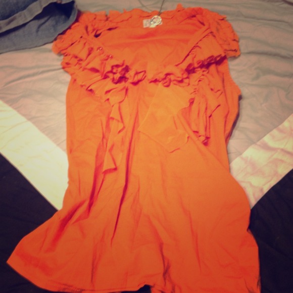 Cute orange shirt for dress up or down