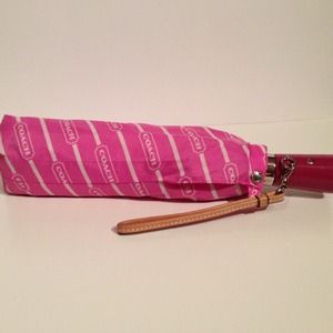 Pink authentic Coach print umbrella and cover