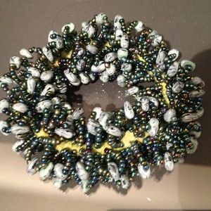 Emerald jewels accent hair-bracelet accessory
