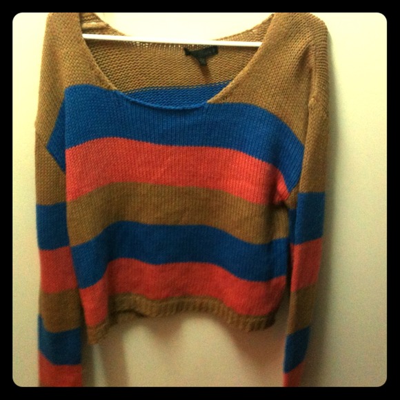 A knitted long sleeve light weight sweater