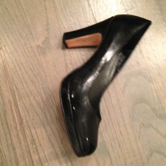 BCBG Maxazria black patent leather shoes.