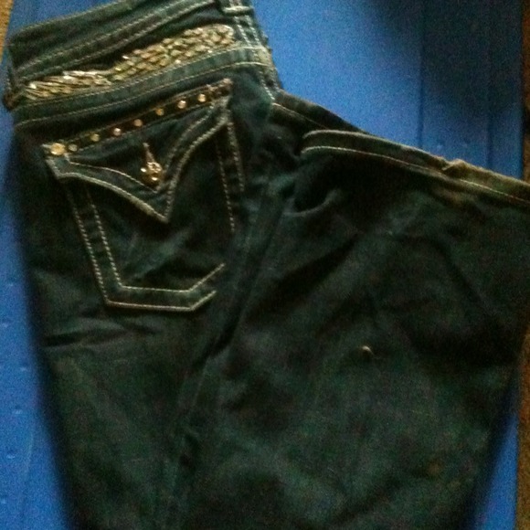 RESERVEDMiss me's: please note the broken zipper