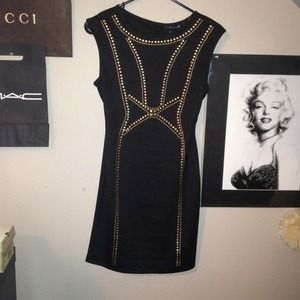 Gold detail black dress. Open back.