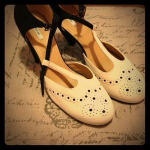 Kimchi blue saddle shoe high heels.