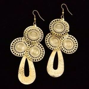 Gold mixed geometric shaped earrings.