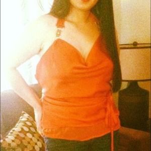 I'm selling this orange top for $20