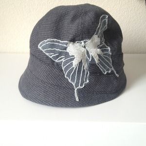 houndstooth pattern with tulle butterfly cloche