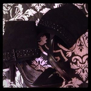 Black fold down heel with decorated buckle