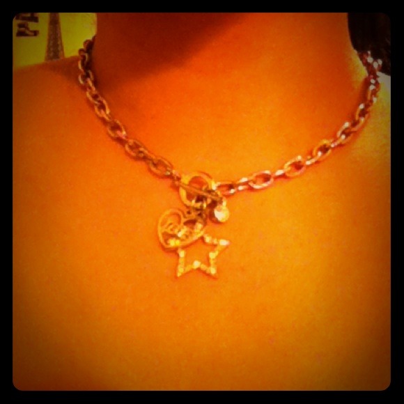 Beautiful necklace with a heart and a star