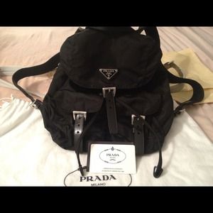 34% off Prada Handbags - Prada classic nylon backpack baby blue ...  