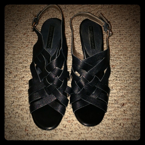 Strappy weaved shoes with wooden heels