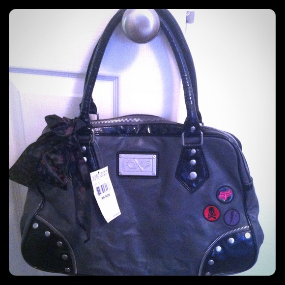 Black leather Fox purse. Brand new with tags!