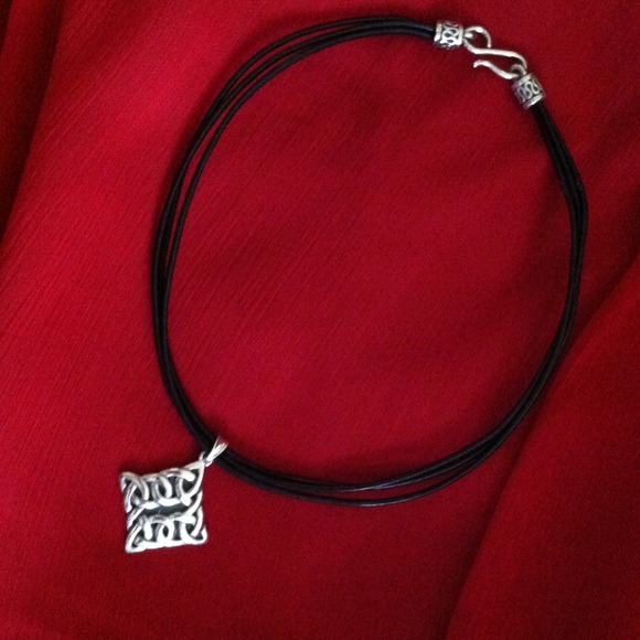 Black necklace w/silver pendant