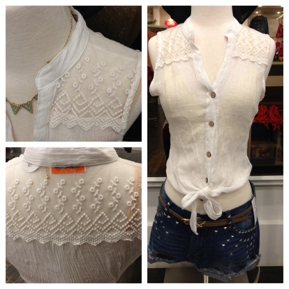 Sleeveless white sheer top